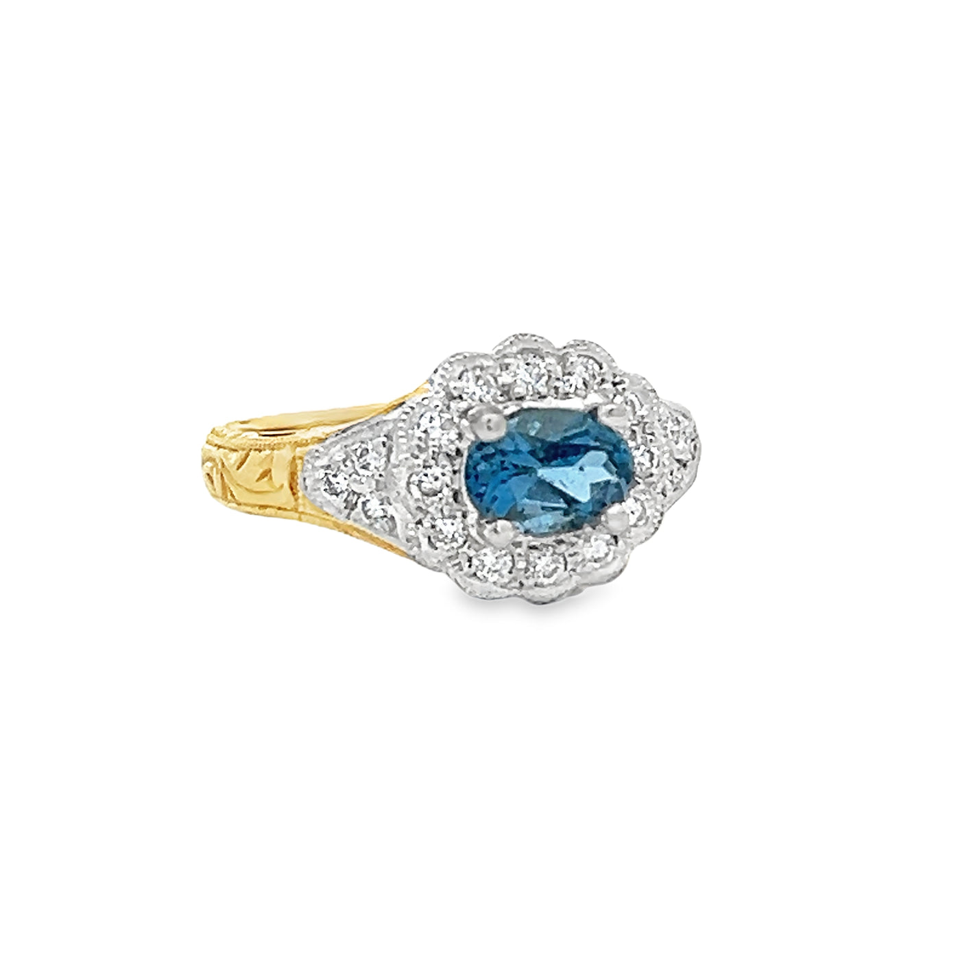 18k Yellow Gold and Platinum Oval Aquamarine and Round Diamond Halo Ring (0.68ctw.)