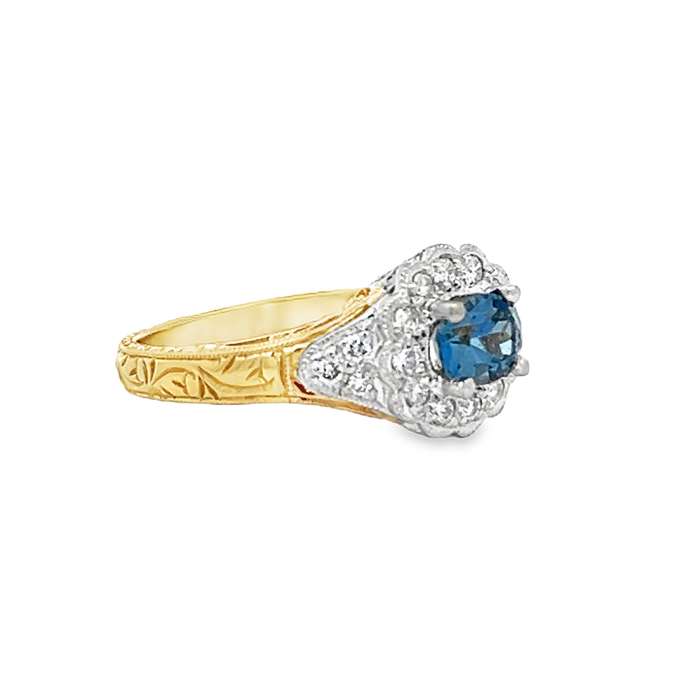 18k Yellow Gold and Platinum Oval Aquamarine and Round Diamond Halo Ring (0.68ctw.)