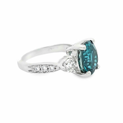 14k White Gold Oval Blue Zircon and Round Diamond Ring (6.11ct.)