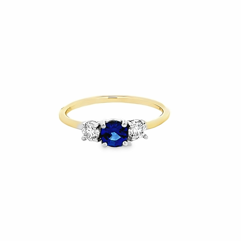 14k Yellow and White Gold Round Sapphire and Diamond Three Stone Ring (0.76ct.)