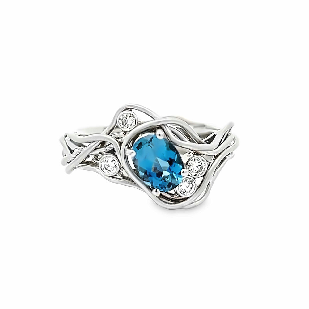 14k White Gold Oval Aquamarine and Diamond Vines Ring by Paul Richter (0.75ct.)
