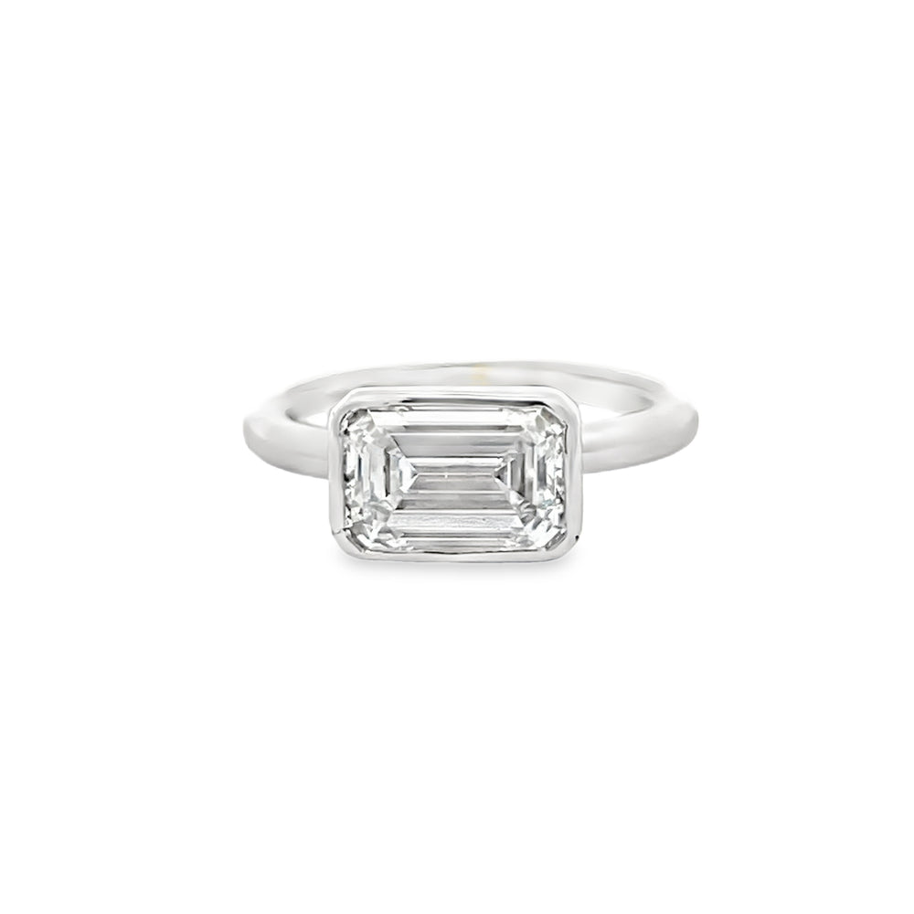 14k White Gold Bezel Set Emerald Cut Lab Grown Diamond Engagement Ring by Paul Richter (3.09ct.)