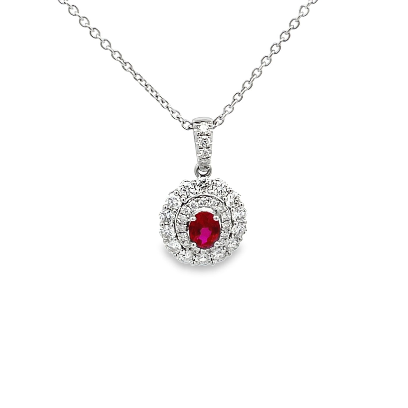 18k White Gold Oval Ruby and Round Diamond Halo Pendant (0.38ct.)