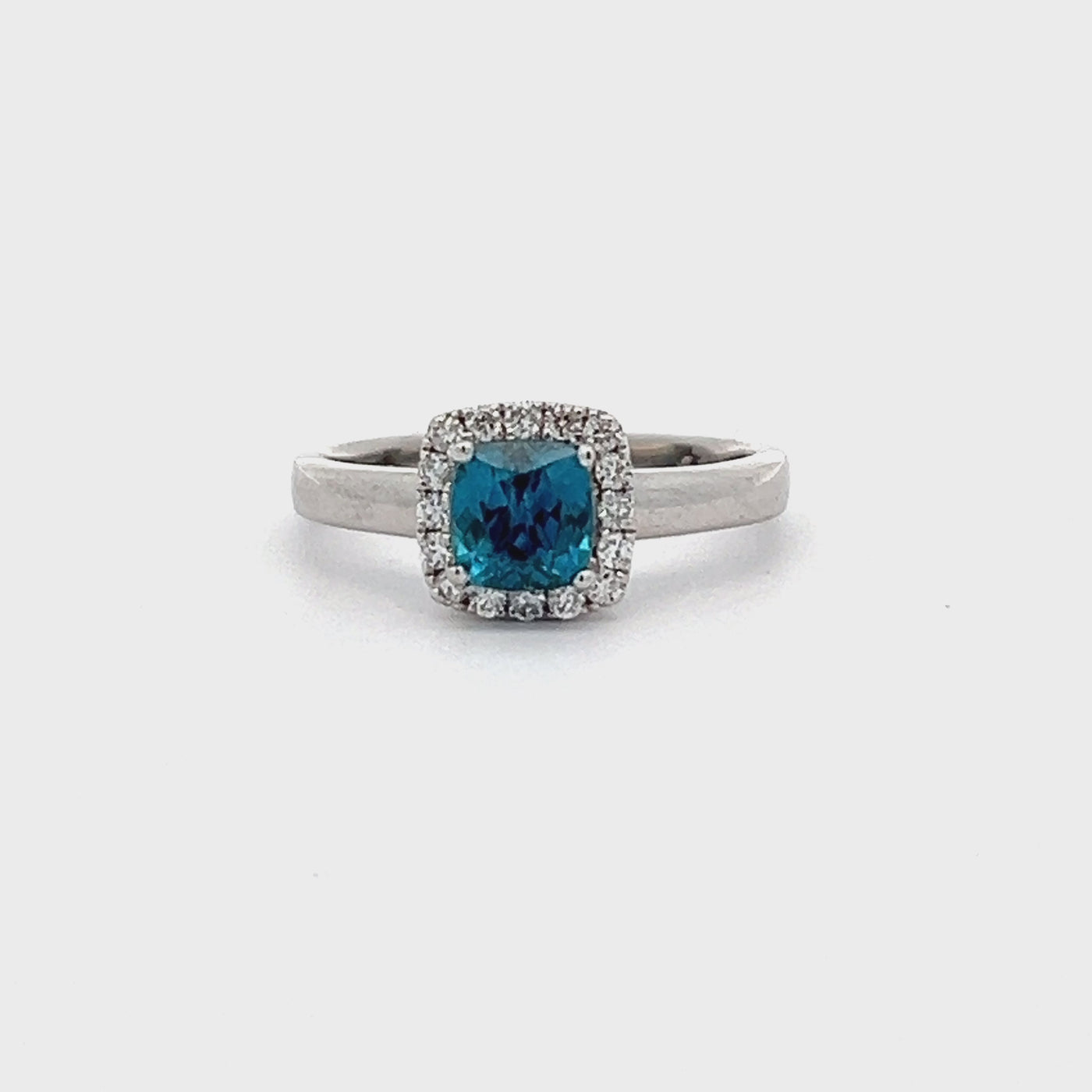 14k White Gold Cushion Cut Blue Zircon and Round Diamond Halo Ring (1.21ct.)