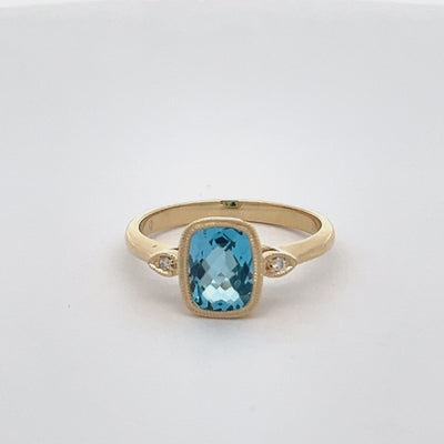 14k White Gold Cushion Cut Blue Topaz and Diamond Bezel Set Ring (1.75ct.)