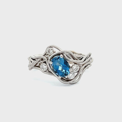 14k White Gold Oval Aquamarine and Diamond Vines Ring by Paul Richter (0.75ct.)