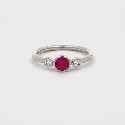 18k White Gold Round Ruby and Diamond Bezel Set Three Stone Ring (0.44ct)