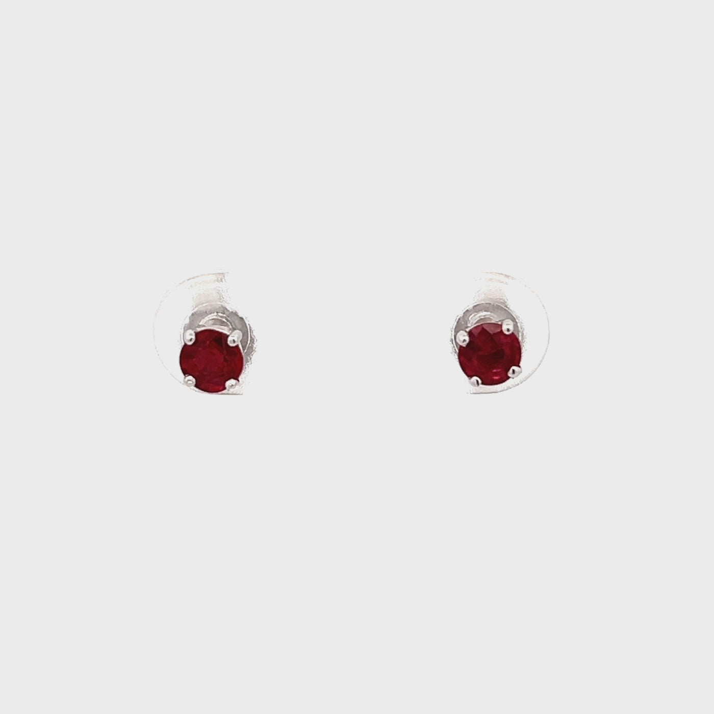 14k White Gold Round Ruby Stud Earrings (0.57ctw.)