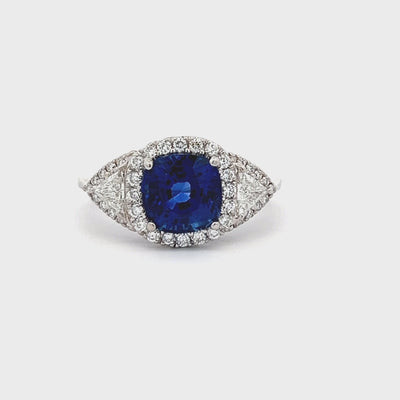 18k White Gold Cushion Cut Sapphire and Diamond Halo Ring (3.12ct.)