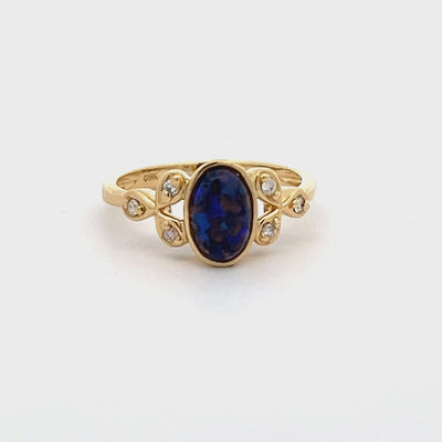 18k Yellow Gold Oval Opal and Round Diamond Bezel Set Ring (0.69ct.)