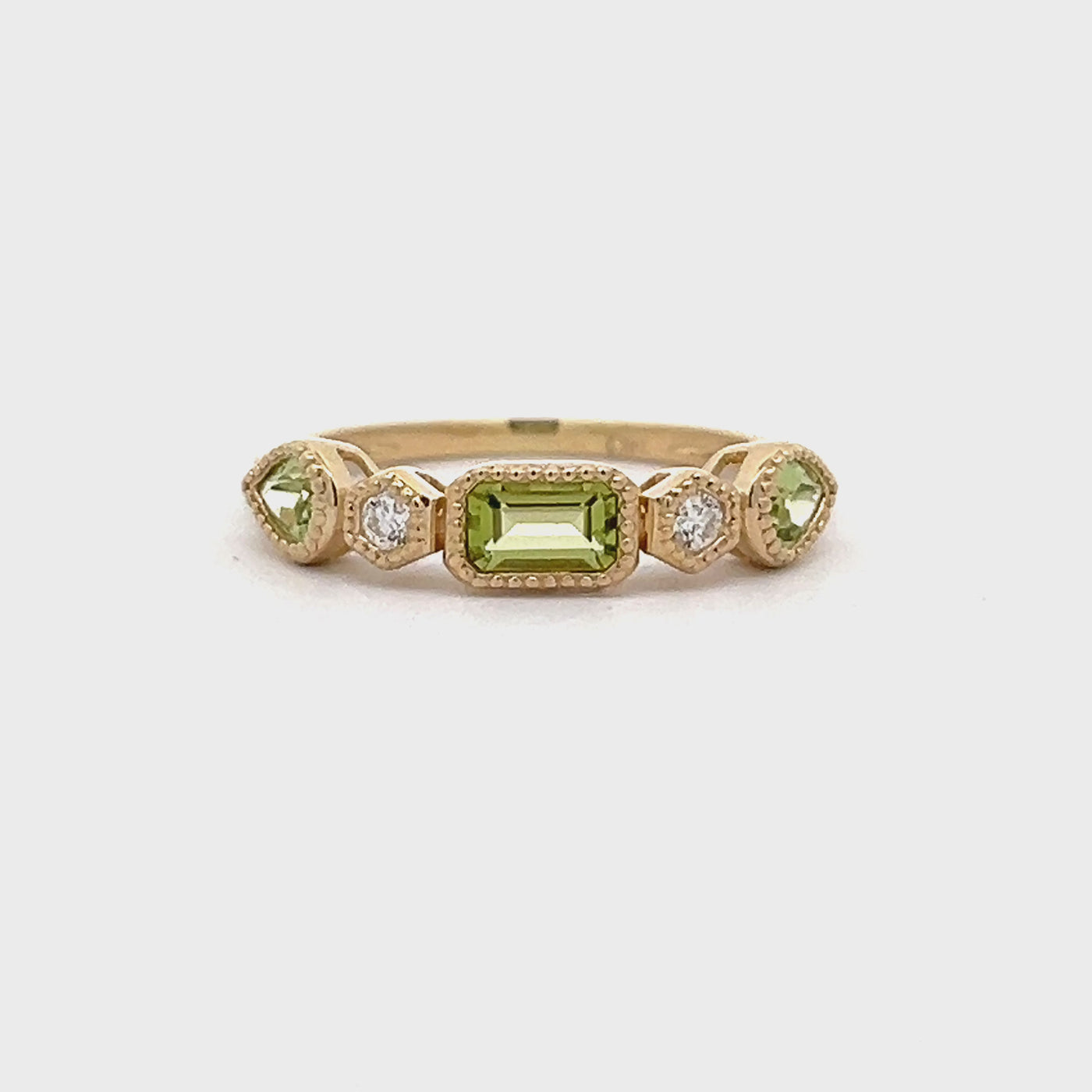 14k Yellow Gold Emerald Cut and Pear Shape Peridot and Round Diamond Anniversary Band (0.66ctw.)