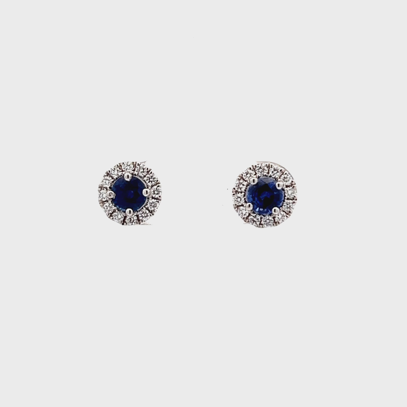 14k White Gold Round Sapphire and Diamond Halo Earrings (0.87ctw.)
