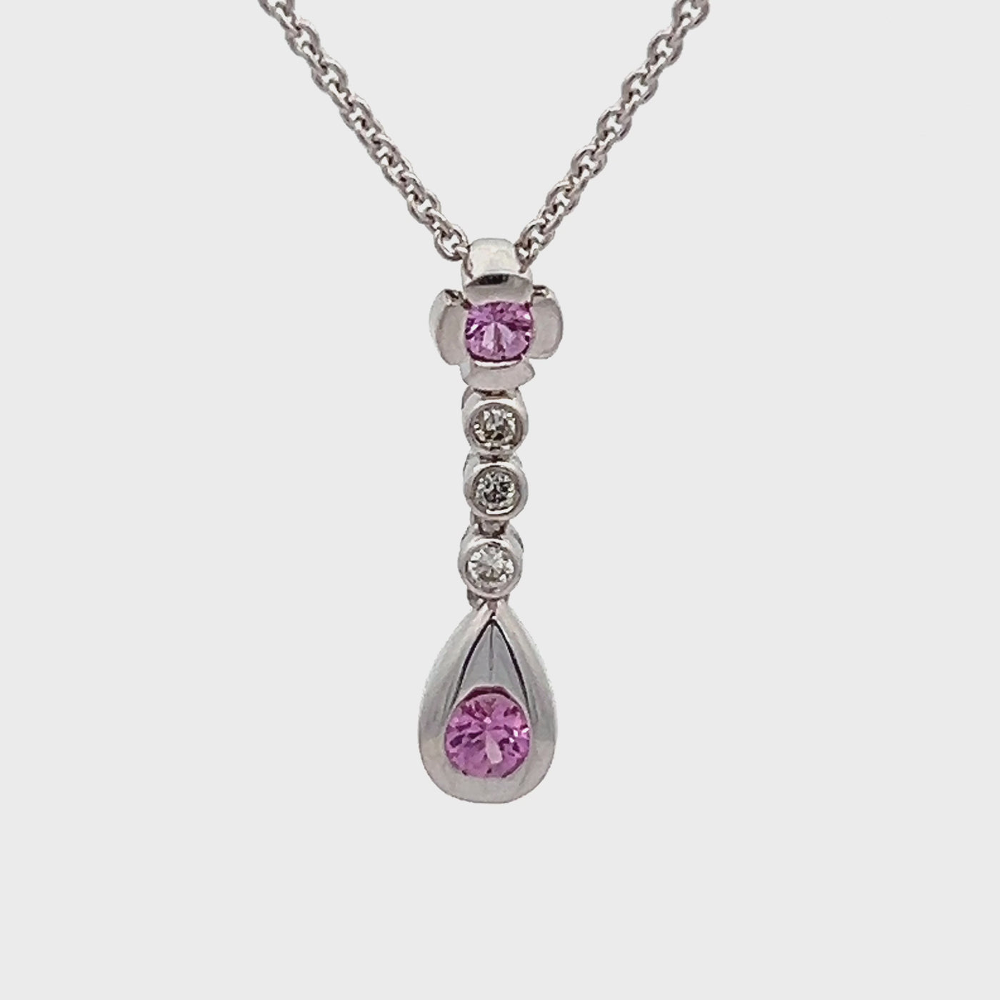 14k White Gold Round Pink Sapphire and Diamond Pendant (0.25ctw.)