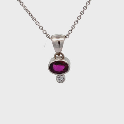 14k White Gold Oval Ruby and Diamond East/West Bezel Set Pendant (0.82ct.)