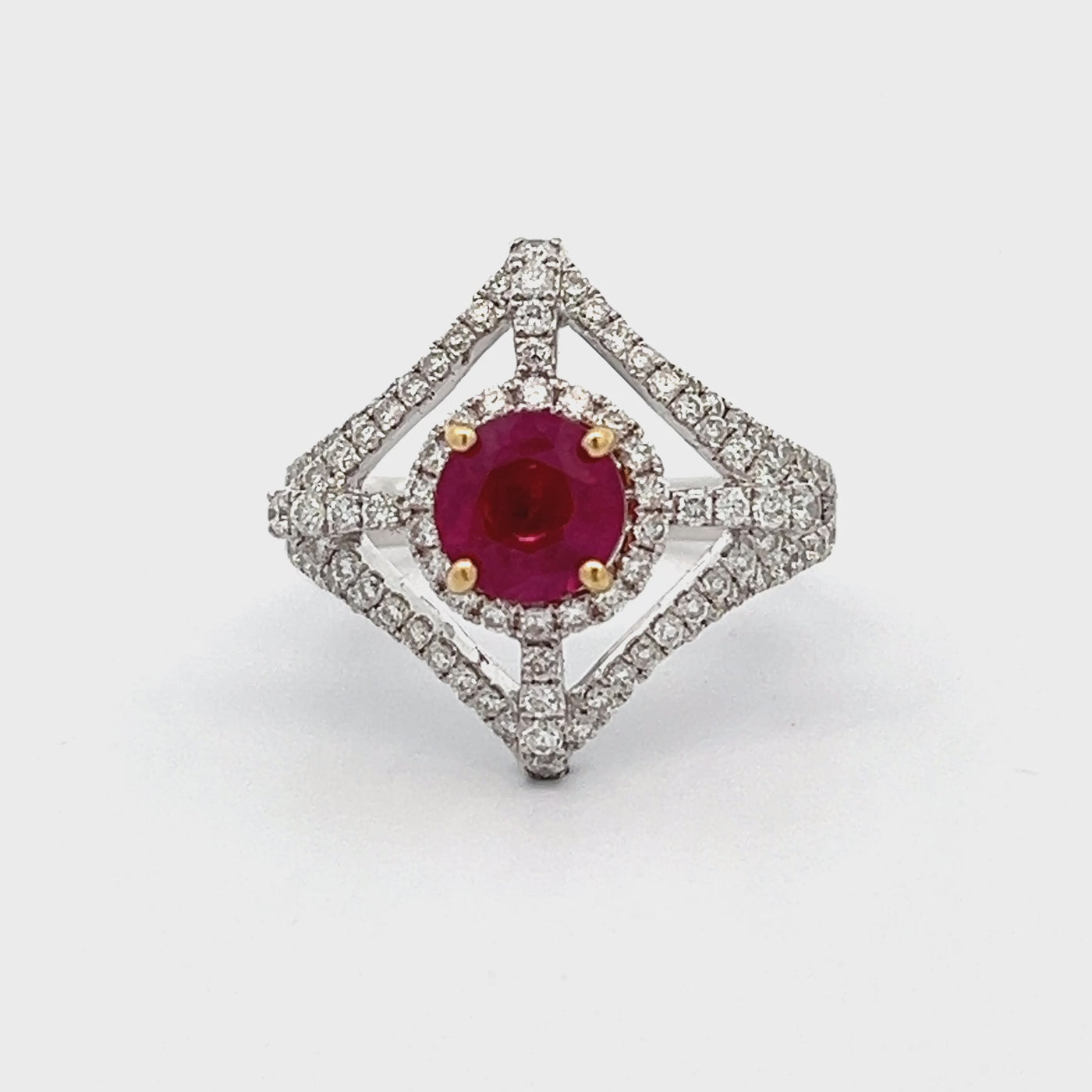 18k Two-Tone White and Yellow Gold Round Ruby and Diamond Halo Ring (1.70ct.)