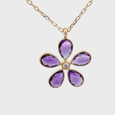 14k Yellow Gold Pear Shape Amethyst and Round Diamond Flower Bezel Set Pendant (6x4mm)