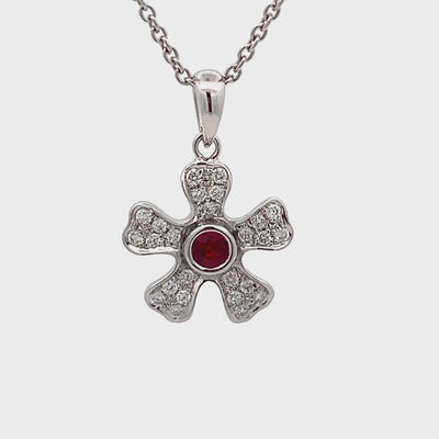 14k White Gold Round Ruby and Diamond Flower Pendant (0.12ct.)