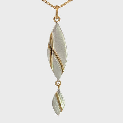 Satin Finished Sterling Silver and 18k Yellow Gold Leaf Pendant by Pendant by Emily VanDerMaelen