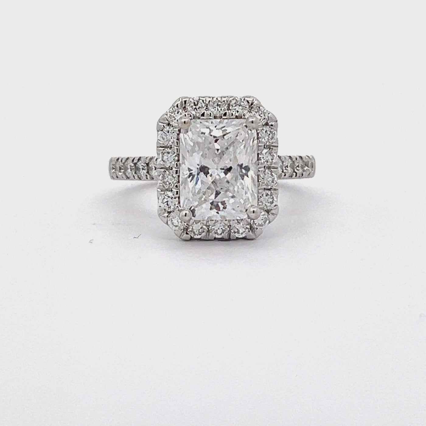 14k White Gold Round Diamond Prong Set Halo Engagement Ring Setting for an Emerald Cut Center Stone (0.71ctw.)